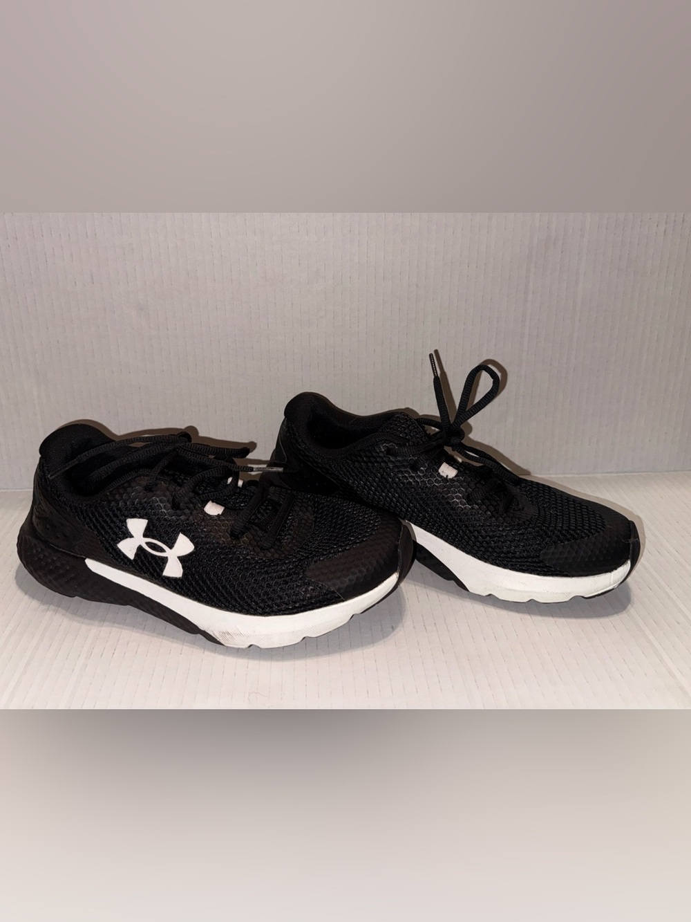 Under Armour Black and White Kids Athletic Sneakers